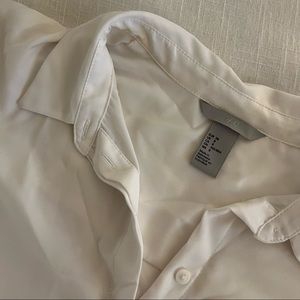 silky white button down shirt.